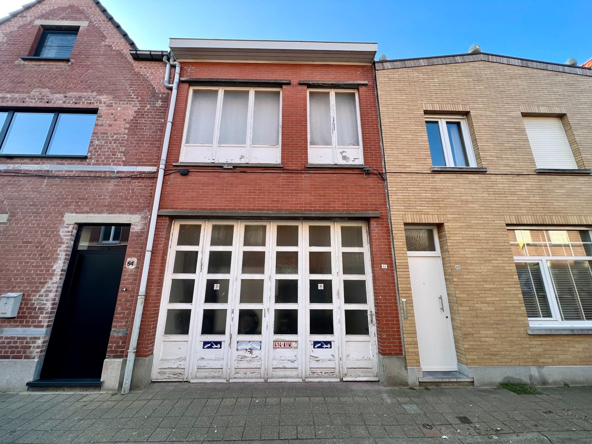 Gevel met inrijpoort